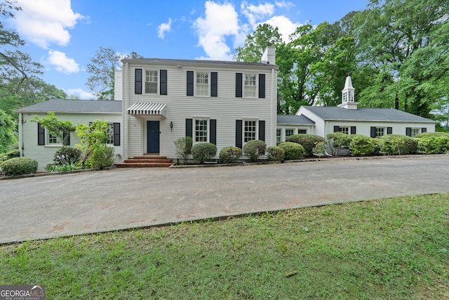 1419 Briarcliff Rd, Macon, GA 31201 - colonial home featuring a chimney