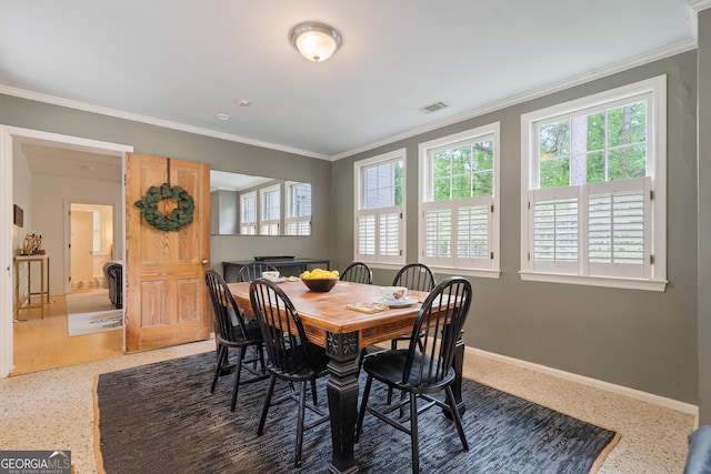 1419 Briarcliff Rd, Macon, GA 31201 - dining space with plenty of natural light, visible vents, and speckled floor