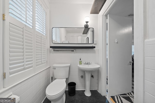 1419 Briarcliff Rd, Macon, GA 31201 - bathroom with a sink, toilet, tile walls, tile patterned flooring, and crown molding