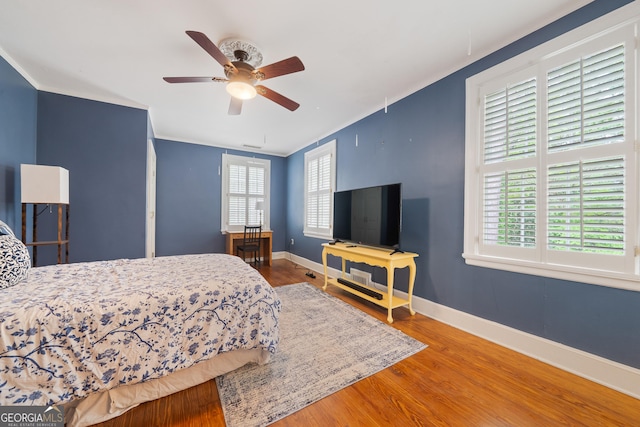 1419 Briarcliff Rd, Macon, GA 31201 - bedroom with baseboards, crown molding, and wood finished floors
