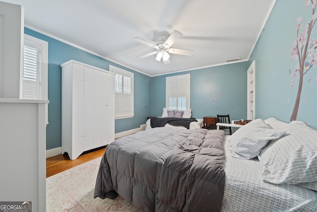 1419 Briarcliff Rd, Macon, GA 31201 - bedroom featuring ceiling fan, baseboards, crown molding, and wood finished floors
