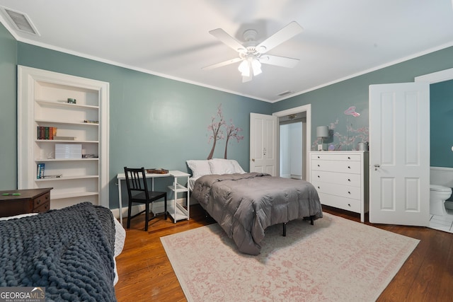 1419 Briarcliff Rd, Macon, GA 31201 - bedroom with wood finished floors, visible vents, and ornamental molding