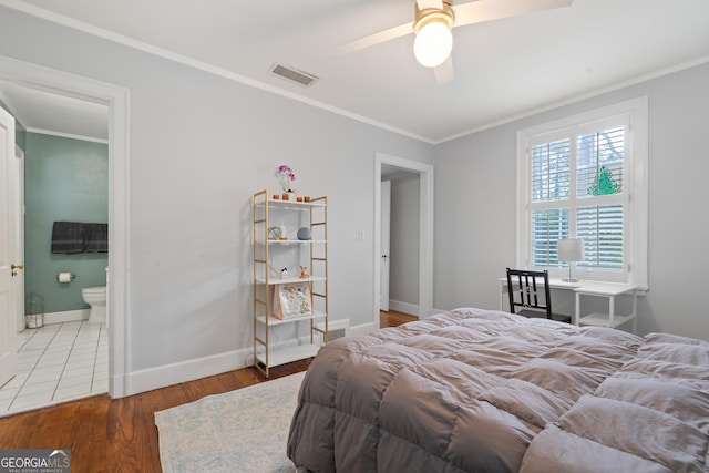 1419 Briarcliff Rd, Macon, GA 31201 - bedroom featuring baseboards, crown molding, wood finished floors, and visible vents