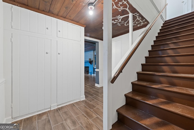 1419 Briarcliff Rd, Macon, GA 31201 - stairway with wood tiled floor, baseboards, and wood ceiling