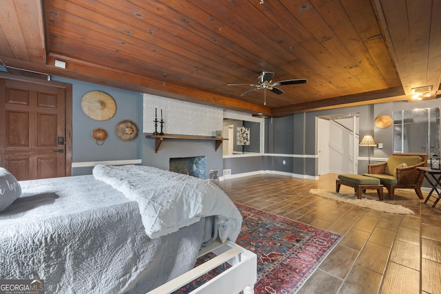 1419 Briarcliff Rd, Macon, GA 31201 - bedroom featuring wooden ceiling, a tray ceiling, and wood finished floors