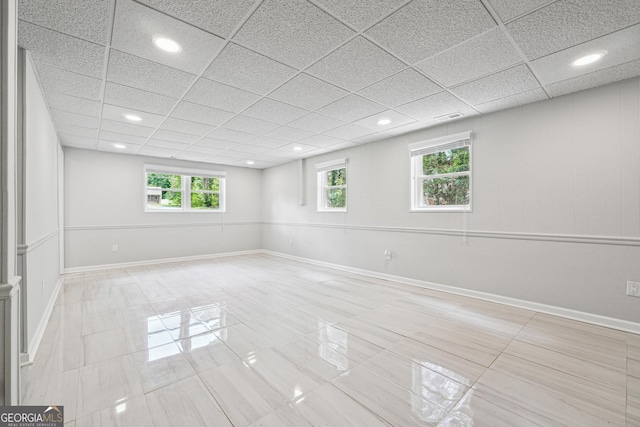 851 Rockbridge Rd SW, Lilburn, GA 30047 - spare room with visible vents, a paneled ceiling, light tile patterned floors, and recessed lighting