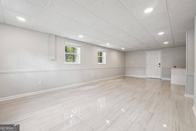 851 Rockbridge Rd SW, Lilburn, GA 30047 - basement with baseboards, recessed lighting, and a drop ceiling