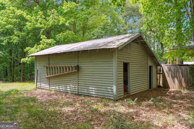 851 Rockbridge Rd SW, Lilburn, GA 30047 - view of outbuilding featuring fence and an outbuilding