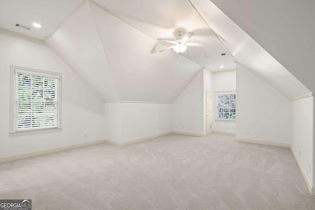 2480 Flint Creek Dr, Cumming, GA 30041 - additional living space featuring baseboards, lofted ceiling, carpet flooring, and visible vents