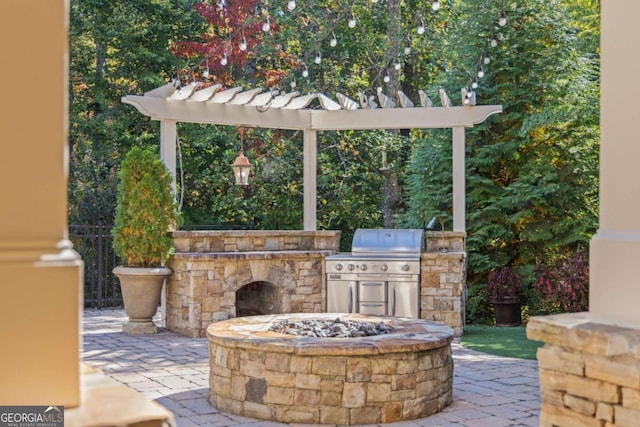 2480 Flint Creek Dr, Cumming, GA 30041 - view of patio featuring an outdoor stone fireplace and area for grilling