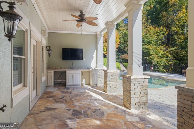 2480 Flint Creek Dr, Cumming, GA 30041 - view of patio featuring an outdoor kitchen, ceiling fan, a fenced in pool, and a sink