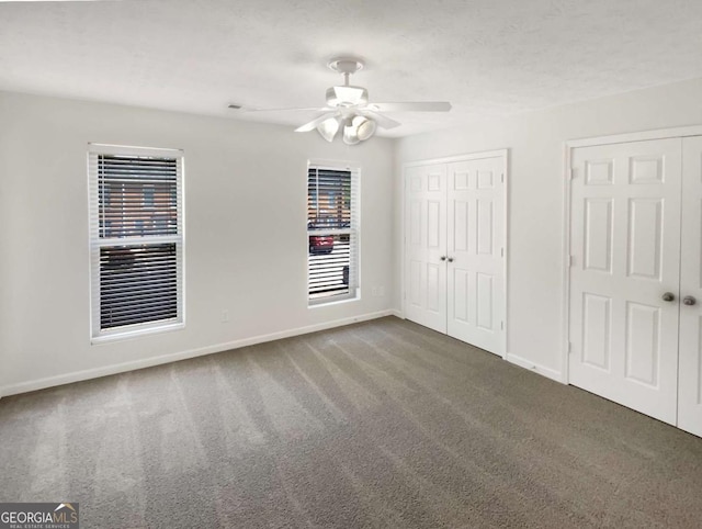 165 N River Dr Unit B, Atlanta, GA 30350 - unfurnished bedroom with carpet flooring and ceiling fan