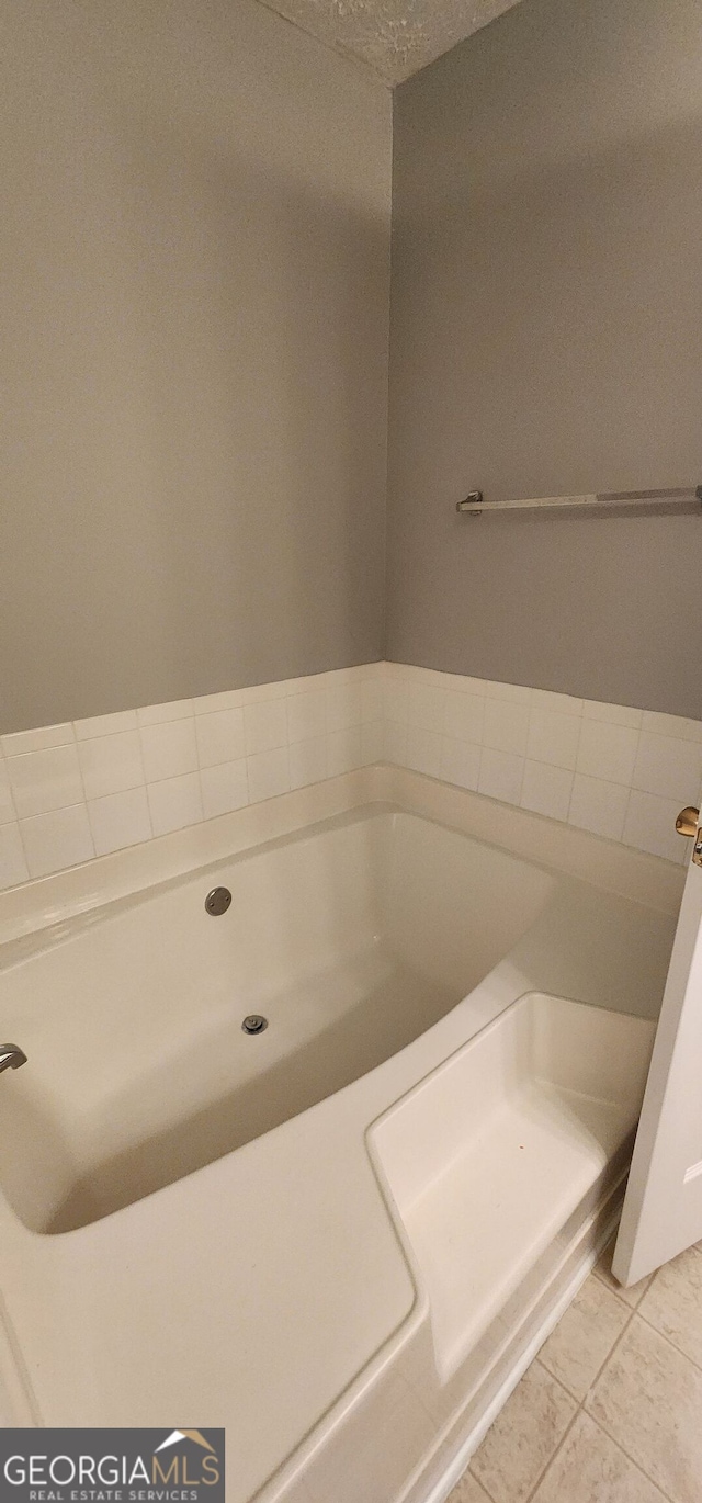 full bath featuring a garden tub