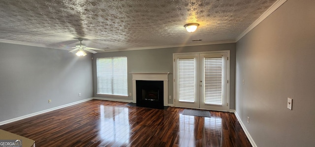 unfurnished living room featuring ornamental molding, a fireplace with flush hearth, baseboards, dark wood-type flooring, and a ceiling fan