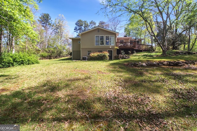 view of yard with a deck