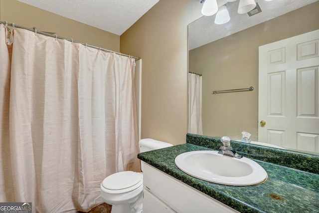 108 Magnolia Plantation Trce Unit 108, Hinesville, GA 31313 - full bath featuring a textured ceiling, toilet, and vanity