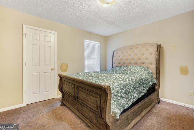 108 Magnolia Plantation Trce Unit 108, Hinesville, GA 31313 - bedroom featuring baseboards, carpet, and a textured ceiling