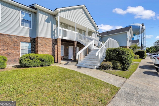 108 Magnolia Plantation Trce Unit 108, Hinesville, GA 31313 - view of property featuring stairs