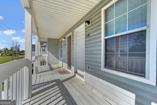 108 Magnolia Plantation Trce Unit 108, Hinesville, GA 31313 - wooden terrace with covered porch