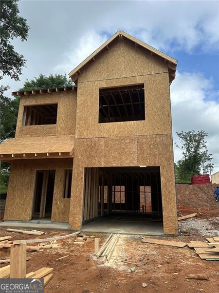back of house with stucco siding