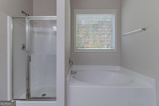 440 Dublin Way, Dallas, GA 30132 - bathroom featuring a shower stall and a bath