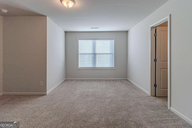 440 Dublin Way, Dallas, GA 30132 - spare room featuring visible vents, carpet flooring, and baseboards