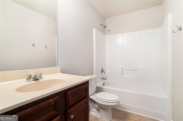 2212 Reddy Farm Ln, Grayson, GA 30017 - bathroom with tile patterned flooring, toilet, vanity, and bathing tub / shower combination