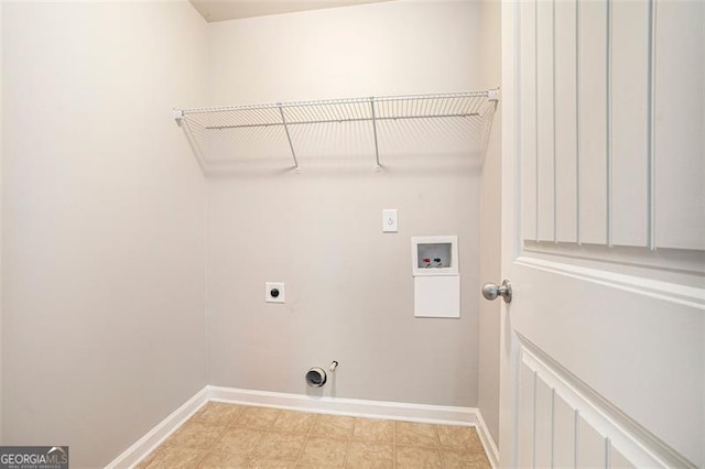 2212 Reddy Farm Ln, Grayson, GA 30017 - laundry room featuring hookup for an electric dryer, baseboards, washer hookup, gas dryer hookup, and laundry area