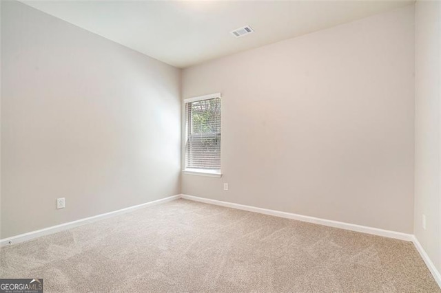 2212 Reddy Farm Ln, Grayson, GA 30017 - unfurnished room featuring baseboards, visible vents, and light colored carpet
