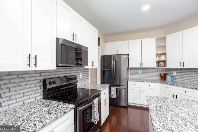 1533 Fallen Leaf Dr SW, Marietta, GA 30064 - kitchen with backsplash, white cabinetry, open shelves, and stainless steel appliances