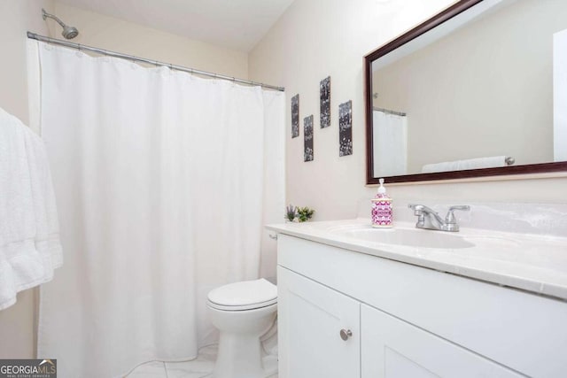 1533 Fallen Leaf Dr SW, Marietta, GA 30064 - bathroom with vanity, marble finish floor, and toilet
