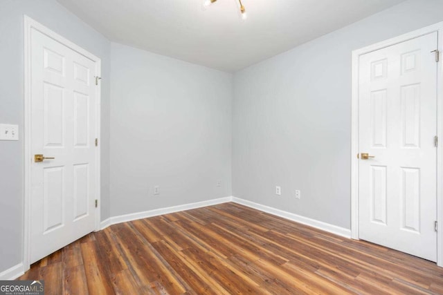 1533 Fallen Leaf Dr SW, Marietta, GA 30064 - empty room with baseboards and wood finished floors