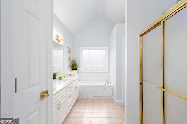 1533 Fallen Leaf Dr SW, Marietta, GA 30064 - bathroom featuring lofted ceiling, tile patterned floors, vanity, and a garden tub