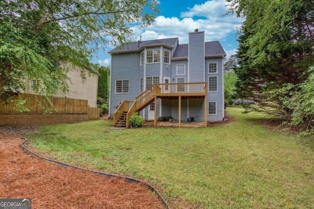 1533 Fallen Leaf Dr SW, Marietta, GA 30064 - rear view of property featuring a chimney, fence, stairway, a deck, and a yard