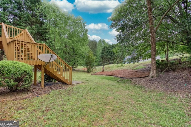 1533 Fallen Leaf Dr SW, Marietta, GA 30064 - view of yard featuring a wooden deck and stairway
