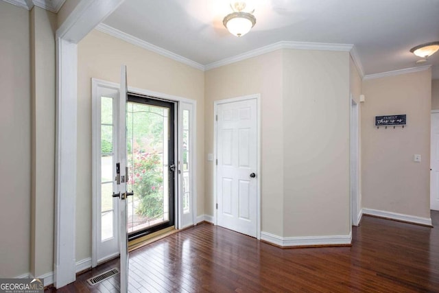 1533 Fallen Leaf Dr SW, Marietta, GA 30064 - entryway with baseboards, visible vents, crown molding, and hardwood / wood-style flooring