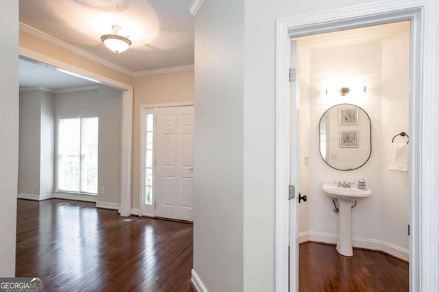 1533 Fallen Leaf Dr SW, Marietta, GA 30064 - entryway with wood finished floors, crown molding, and baseboards