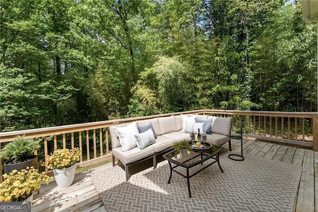 wooden deck with an outdoor hangout area