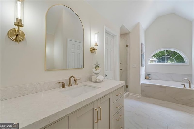 full bathroom featuring a shower stall, vaulted ceiling, a bath, and vanity