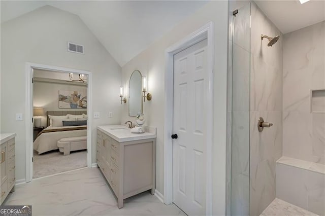 ensuite bathroom featuring visible vents, marble finish floor, vanity, and a marble finish shower