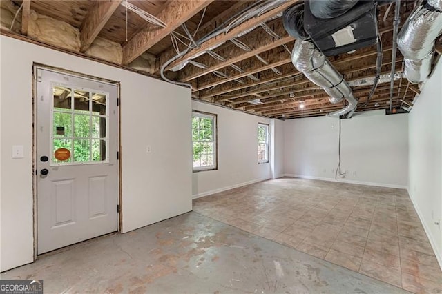 basement featuring baseboards