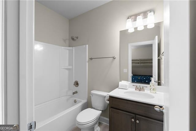 bathroom featuring vanity,  shower combination, and toilet