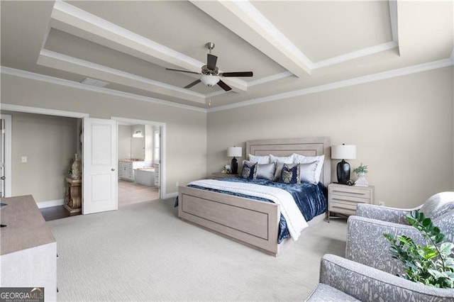 bedroom with carpet floors, crown molding, a tray ceiling, and baseboards