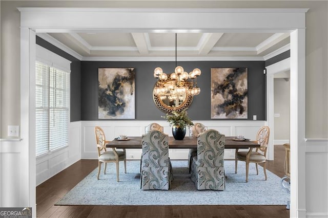 dining room featuring a decorative wall, crown molding, wood finished floors, beamed ceiling, and a notable chandelier