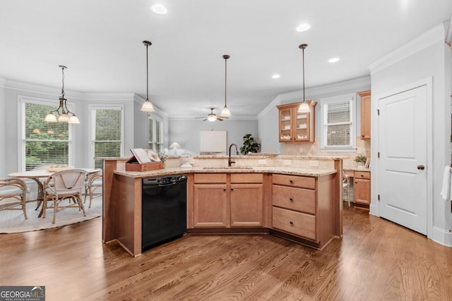 1985 Chapel Estates Ln, Dacula, GA 30019 - kitchen with black dishwasher, crown molding, wood finished floors, recessed lighting, and decorative light fixtures