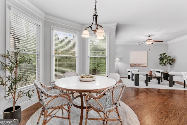 1985 Chapel Estates Ln, Dacula, GA 30019 - dining room with ornamental molding, a ceiling fan, and dark wood-style floors