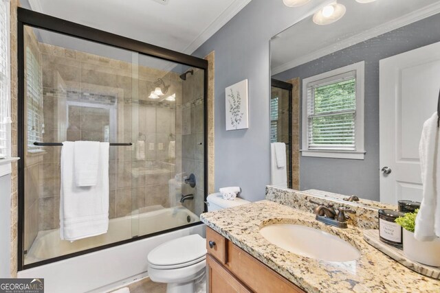 1985 Chapel Estates Ln, Dacula, GA 30019 - full bath featuring vanity, crown molding, and bath / shower combo with glass door