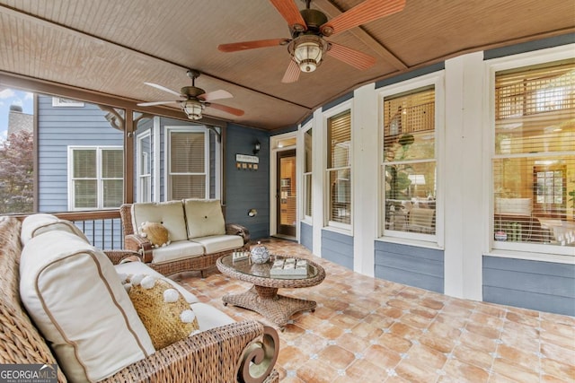 1985 Chapel Estates Ln, Dacula, GA 30019 - sunroom / solarium featuring ceiling fan, an outdoor hangout area, and lofted ceiling