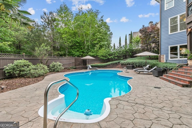 1985 Chapel Estates Ln, Dacula, GA 30019 - view of swimming pool with a patio area and a fenced backyard