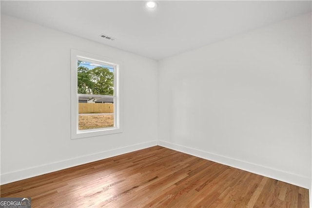 1835 Hawkins St, Smyrna, GA 30080 - unfurnished room featuring recessed lighting, visible vents, light wood finished floors, and baseboards